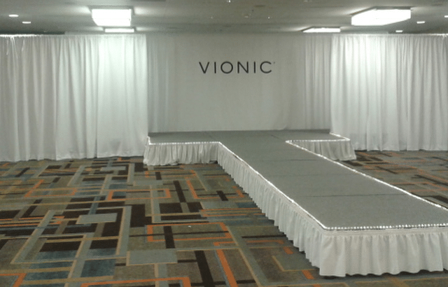 stage setup of an indoor conference runway or walkway